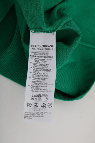 Green silk crystal banana sweater by Dolce & Gabbana featuring a vibrant knitted design with crystal embellishments.