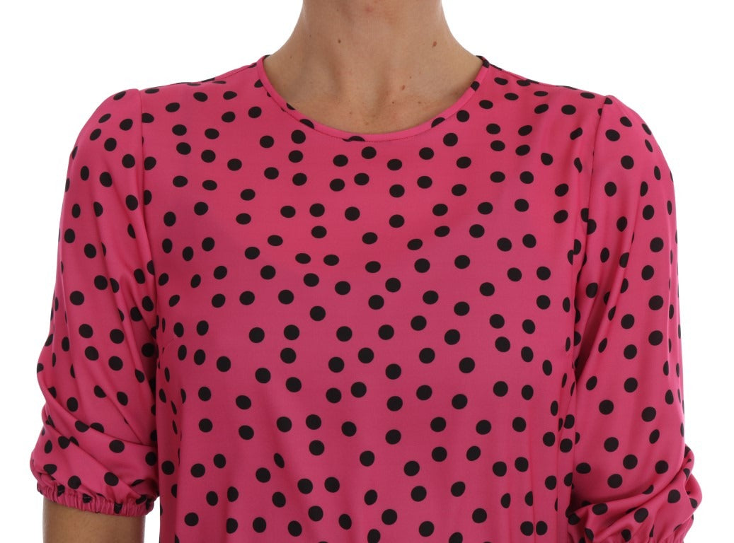 Pink polka dotted silk blouse by Dolce & Gabbana, featuring a stylish and elegant design with a classic collar and long sleeves.