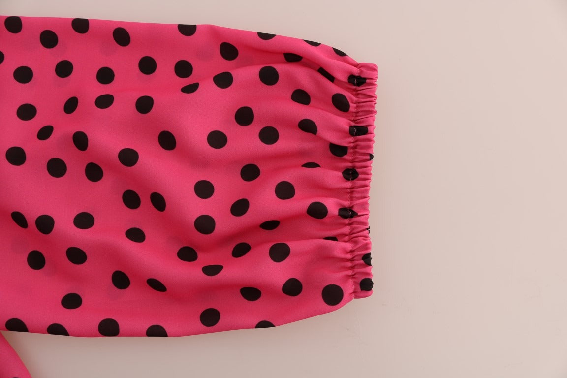Pink polka dotted silk blouse by Dolce & Gabbana, featuring a stylish, lightweight fabric with a feminine fit and classic design.