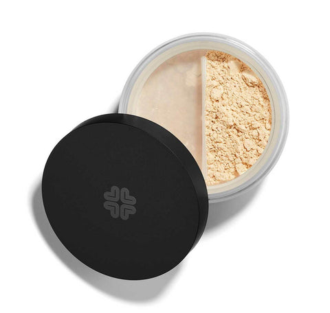 Lily Lolo Mineral Star Dust Illuminator in compact jar with shimmer, by Jag Couture London New York, close-up of product container.