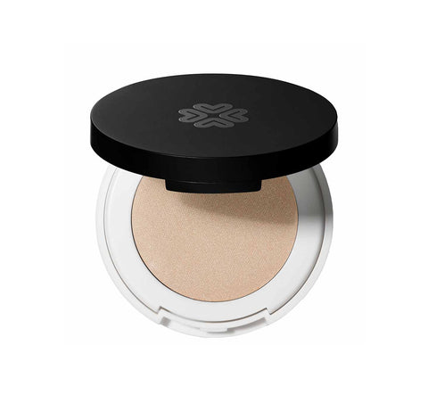 Jag Couture London Ivory Tower compact eyeshadow by Lily Lolo, showing the soft ivory shade in a sleek, round container.