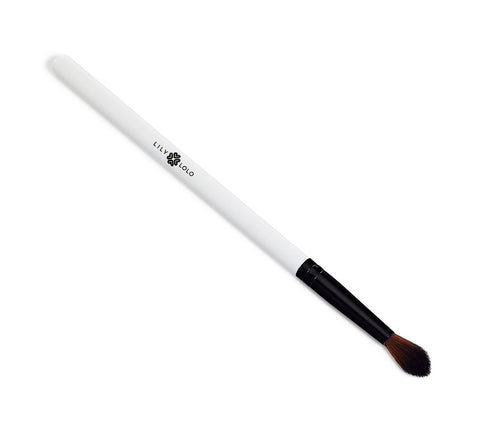 Jag Couture London eye shadow brush by Lily Lolo for smoky eye makeup, featuring soft bristles and sleek handle design.