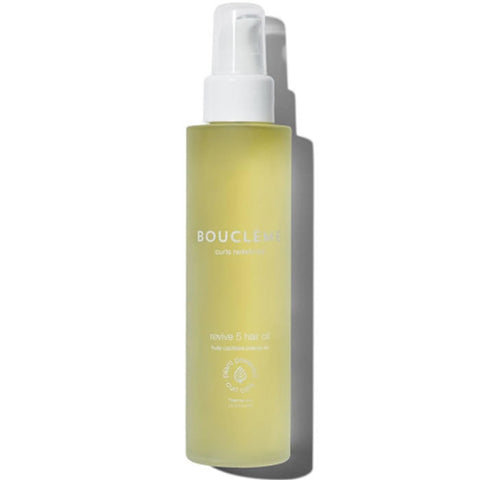 Jag Couture London Bouclème Curls Redefined Revive 5 Hair Oil 100ml bottle, featuring sleek packaging and vibrant branding.