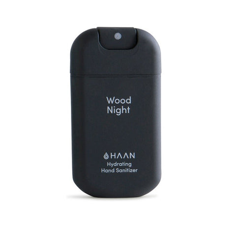 Hydrating hand sanitizer in a 30ml Wood Night bottle by Jag Couture London New York, featuring a dark wood-themed design.
