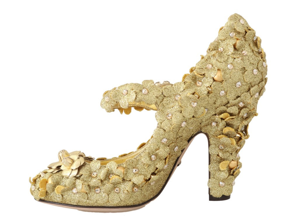 Gold floral crystal Mary Jane pumps by Dolce & Gabbana with decorative floral accents and sparkling crystal details.