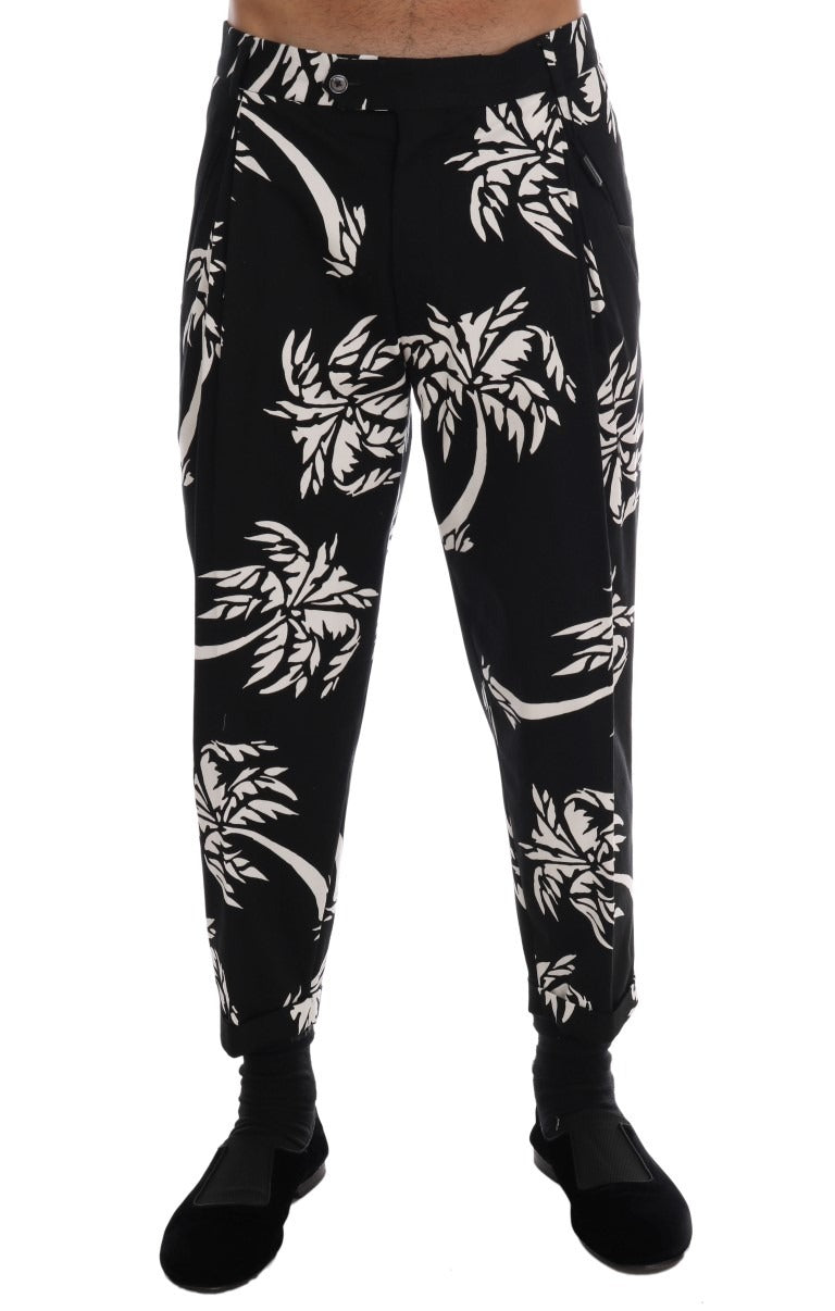Black cotton stretch pants from Dolce & Gabbana featuring a tailored fit and sleek style, shown on a model.
