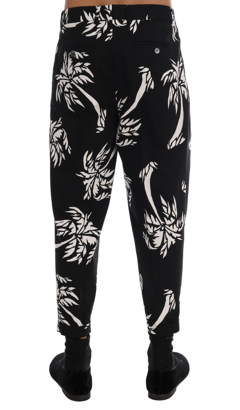 Black Tree Cotton Stretch Pants by Dolce & Gabbana, featuring a slim fit and classic design, shown on a model.