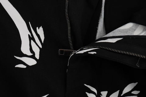 Black Tree Cotton Stretch Pants by Dolce & Gabbana, featuring a fitted design and cotton fabric, shown in a close-up front view.