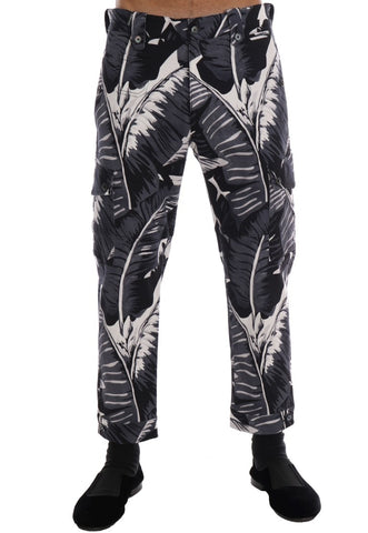 Gray Banana Leaf cotton pants by Dolce & Gabbana, showcasing a relaxed fit and tropical leaf pattern on lightweight fabric.