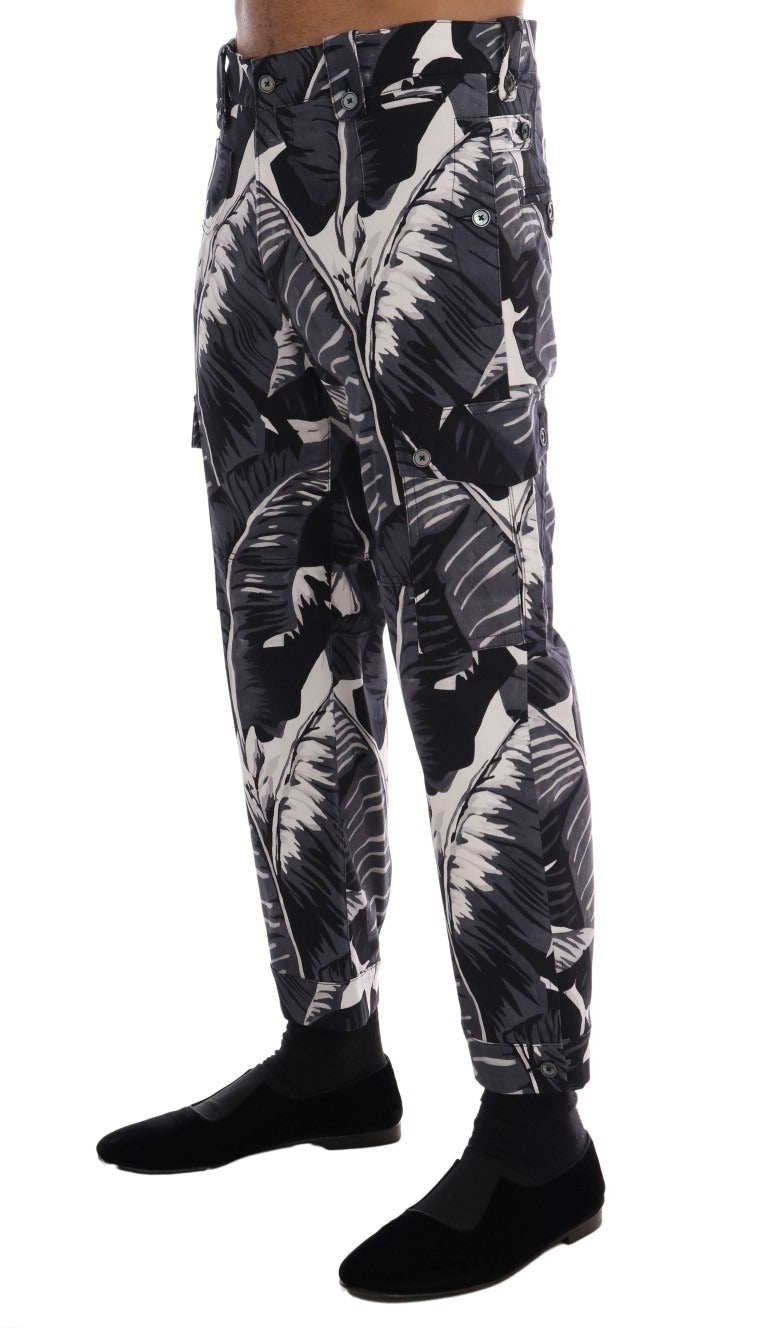 Gray Banana Leaf Cotton Pants by Dolce & Gabbana, featuring a relaxed fit and tropical leaf print, styled with a casual look.