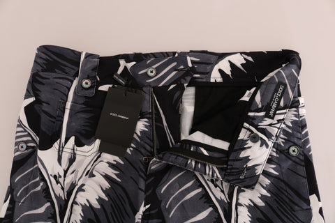 Gray banana leaf cotton pants by Dolce & Gabbana with a relaxed fit and tropical print, displayed on a model.