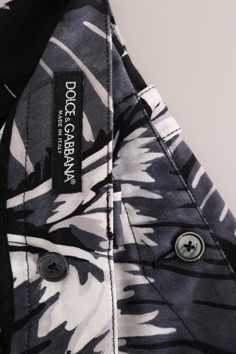 Gray banana leaf cotton pants by Dolce & Gabbana, showing relaxed fit and detailed leaf pattern fabric.