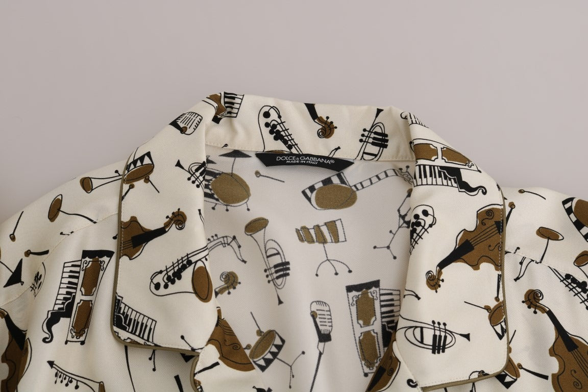 White silk jazz motive print shirt by Dolce & Gabbana featuring a stylish pattern and elegant design.