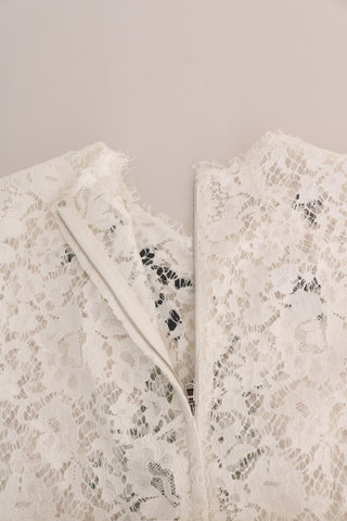 White crystal-embellished lace blouse by Dolce & Gabbana, featuring intricate lace details and elegant design.
