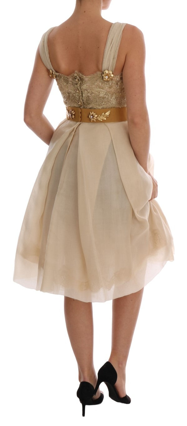 Gold silk dress with crystal embellishments by Dolce & Gabbana, featuring a luxurious fit and elegant design.