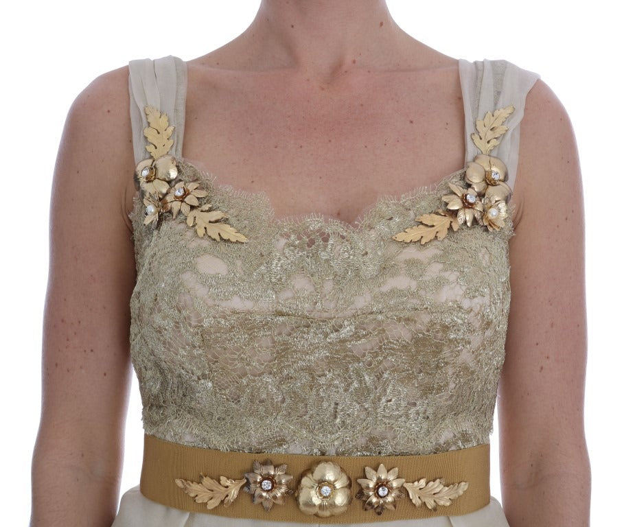Gold silk dress with crystal embellishments by Dolce & Gabbana, featuring elegant design and luxurious fabric details.