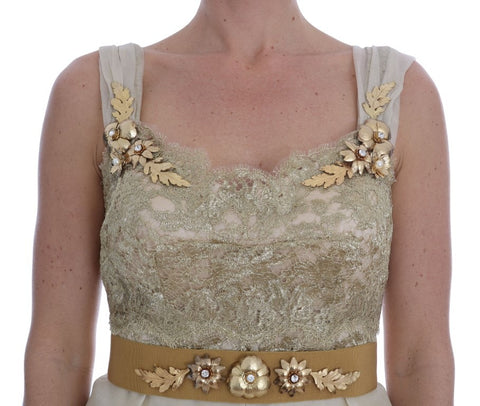 Gold silk dress with crystal embellishments by Dolce & Gabbana, featuring elegant design and luxurious fabric details.