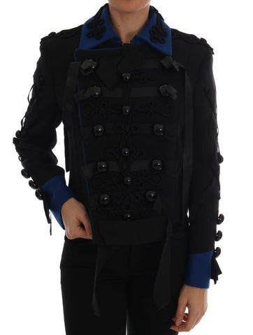 Black wool trench jacket by Dolce & Gabbana, tailored fit with classic collar and button details, displayed on a hanger.