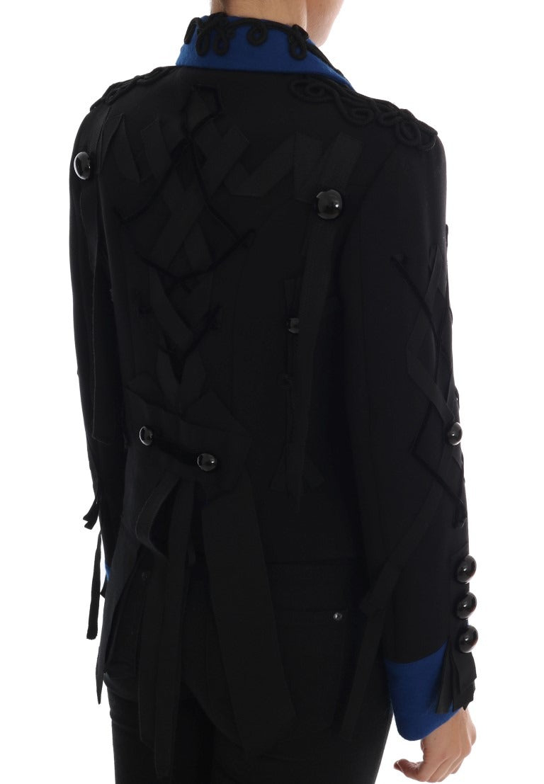 Black wool trench jacket by Dolce & Gabbana with double-breasted buttons and classic collar, styled on a model.