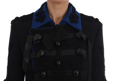 Black wool trench jacket by Dolce & Gabbana, tailored fit with classic lapel collar and belt, shown on a model.