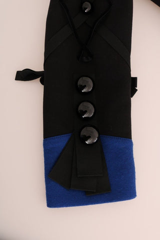 Black wool trench jacket by Dolce & Gabbana showing a tailored fit with classic lapels and a belted waist.