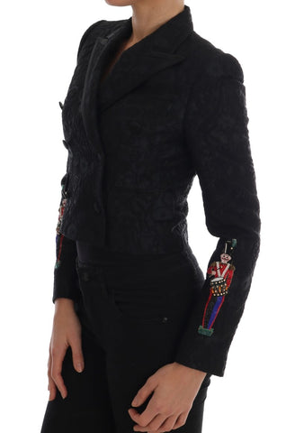 Black brocade blazer jacket by Dolce & Gabbana, tailored fit with intricate floral pattern and classic lapel collar.