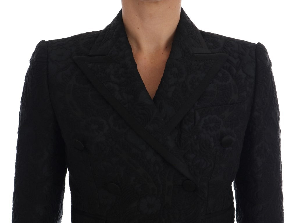 Black brocade blazer jacket by Dolce & Gabbana, tailored fit with intricate floral pattern, front buttons, and classic lapel collar.