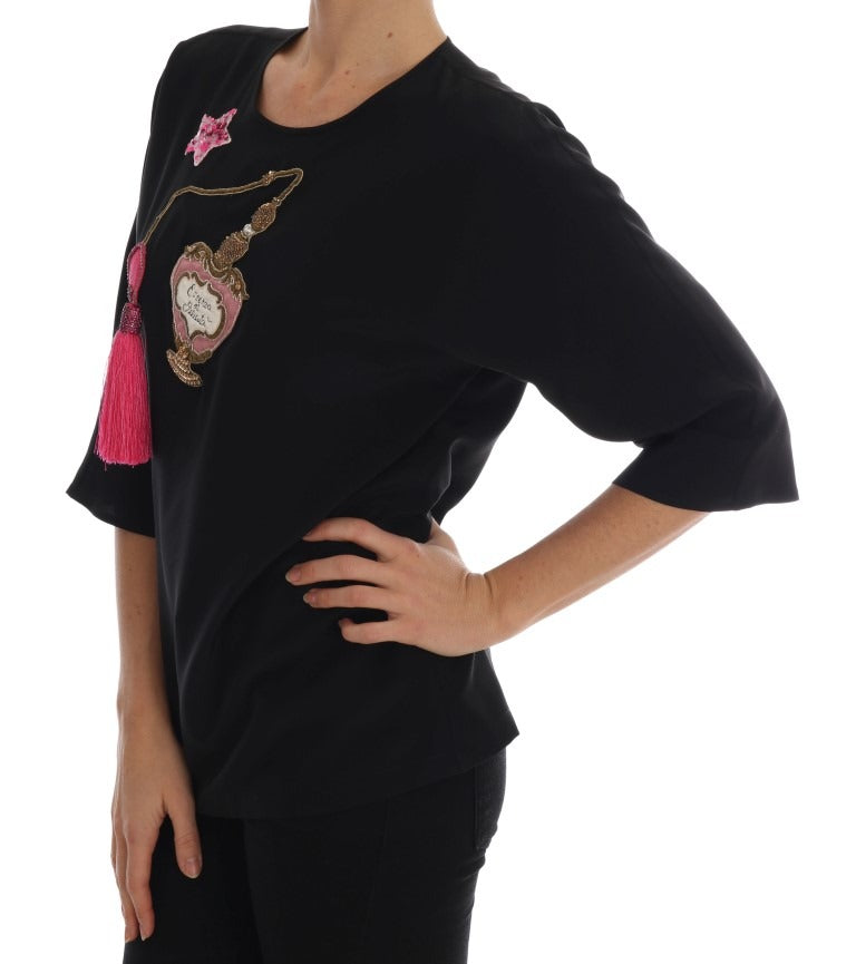 Black silk fairy tale top with crystal embellishments from Dolce & Gabbana, featuring a elegant, flowing design.