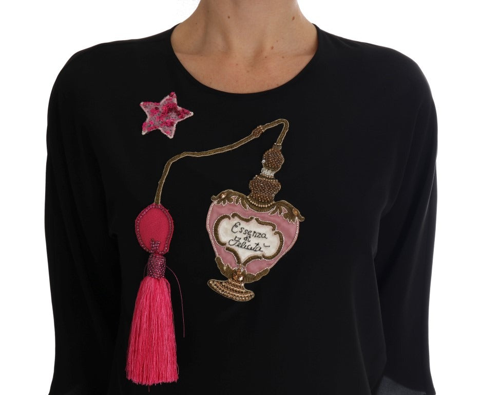 Black silk fairy tale top with crystal embellishments by Dolce & Gabbana, featuring a elegant blouse with intricate detailing.