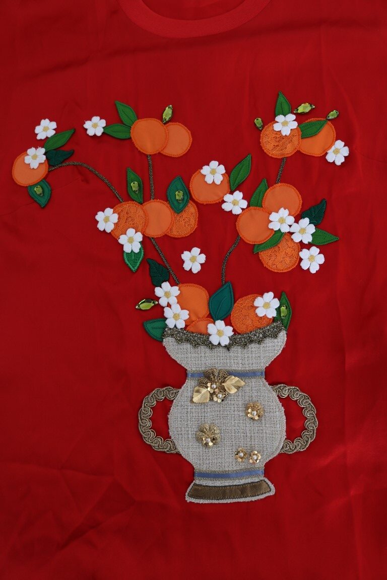 Red silk orange vase with crystal top by Dolce & Gabbana, featuring elegant design and vibrant color.