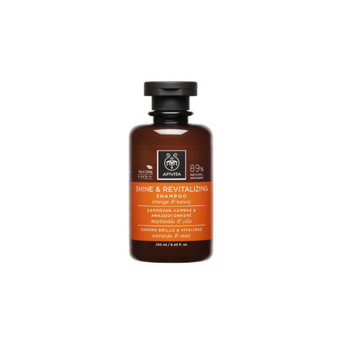 Jag Couture London Shine and Revitalizing Shampoo with orange and honey, 250ml, showing the product bottle with orange and honey accents.