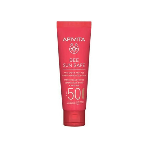 Tinted face cream with SPF50 by Apivita Bee Sun, anti-spot and anti-age defense, 50ml, featuring natural ingredients and a smooth texture.
