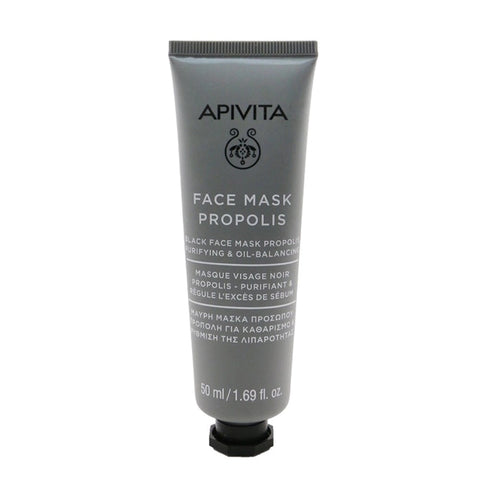 Black face mask with propolis in a 50ml jar, from Apivita, shown in a sleek container with a black lid and labeling.