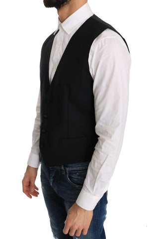 Black wool silk vest by Dolce & Gabbana, featuring a tailored fit and smooth fabric, displayed on a white background.