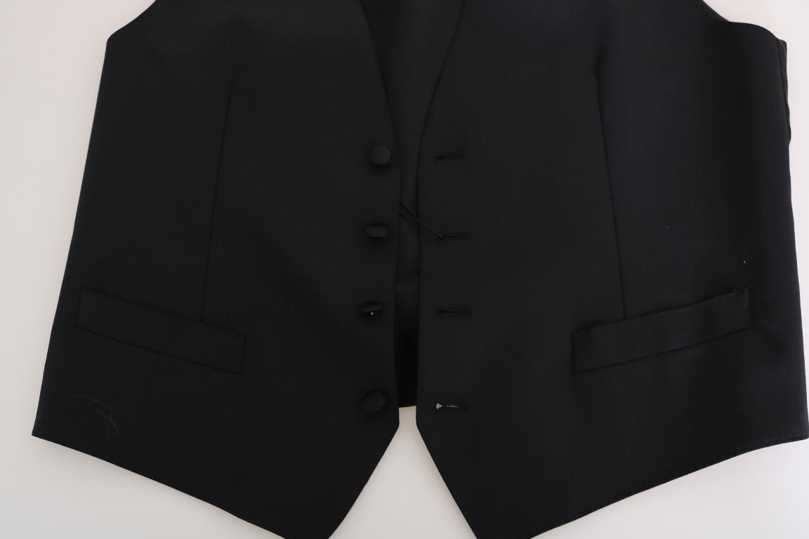 Black wool silk vest by Dolce & Gabbana, featuring a sleek fit and textured fabric, shown on a plain background.