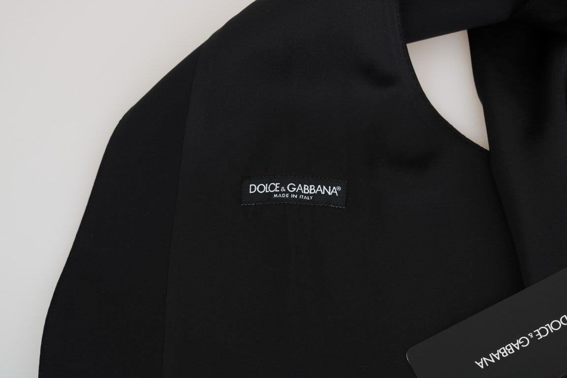 Black wool silk vest by Dolce & Gabbana, featuring a sleek, tailored design with smooth fabric and subtle detailing.