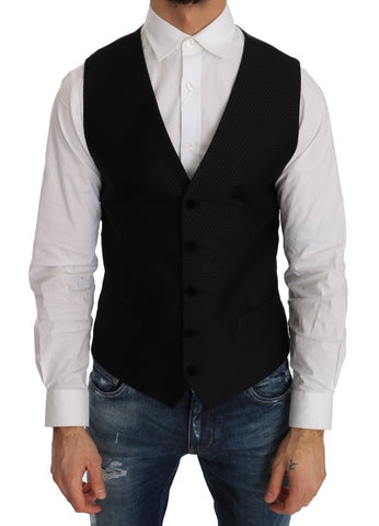 Black polka dot pattern vest by Dolce & Gabbana, featuring a stylish sleeveless design with a fitted silhouette.