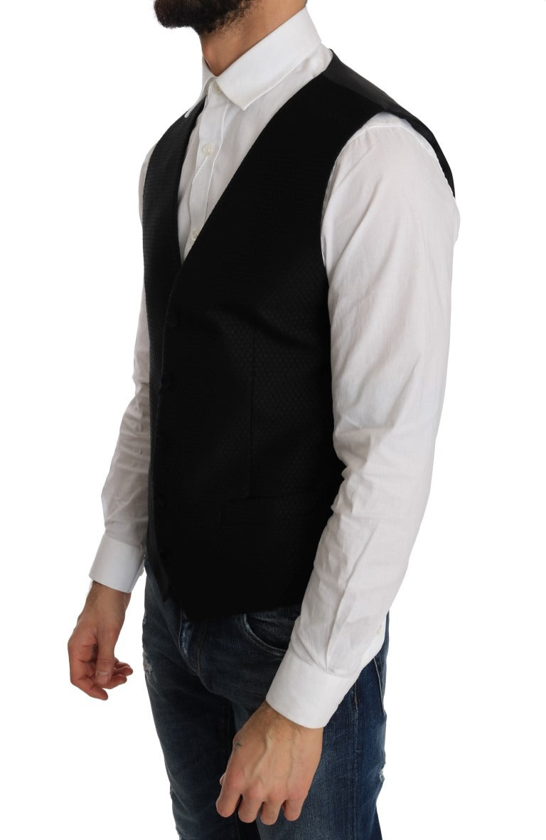 Black polka dot pattern vest by Dolce & Gabbana, featuring a stylish sleeveless design with a classic polka dot print.