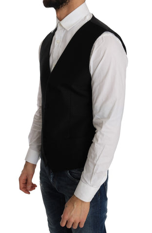 Black polka dot pattern vest by Dolce & Gabbana, featuring a stylish sleeveless design with a classic polka dot print.