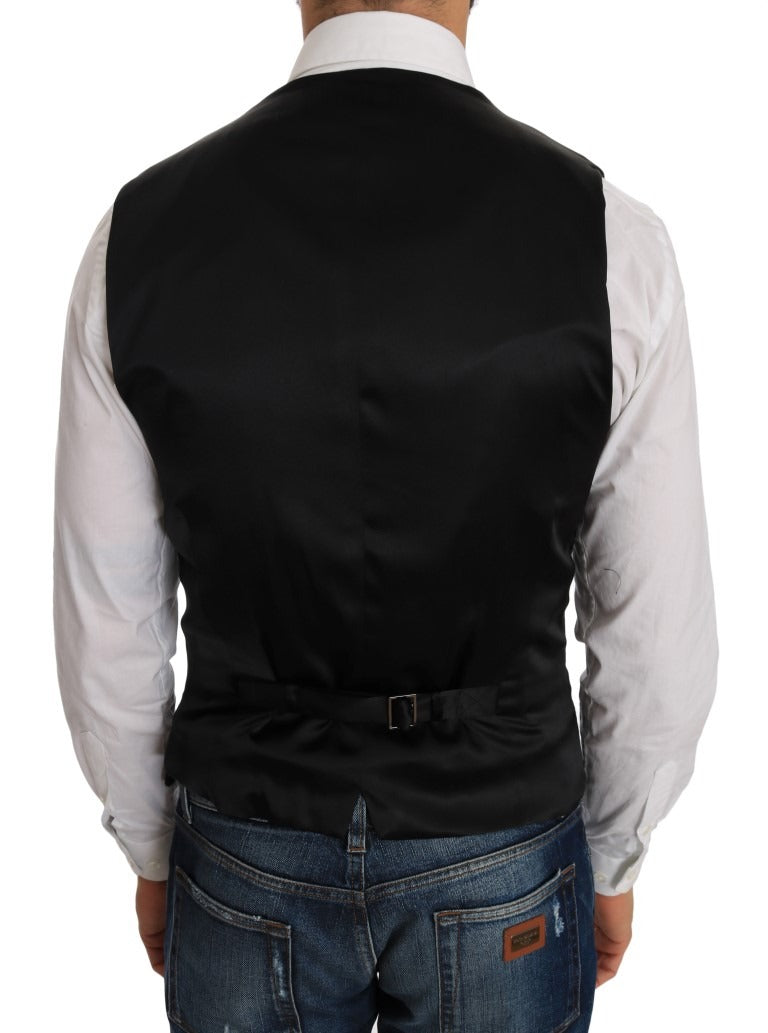 Black polka dot pattern vest by Dolce & Gabbana, featuring a stylish sleeveless design with a classic polka dot print.