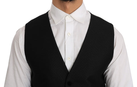 Black polka dot pattern Dolce & Gabbana vest with sleeveless design and fitted silhouette, displayed on a plain background.