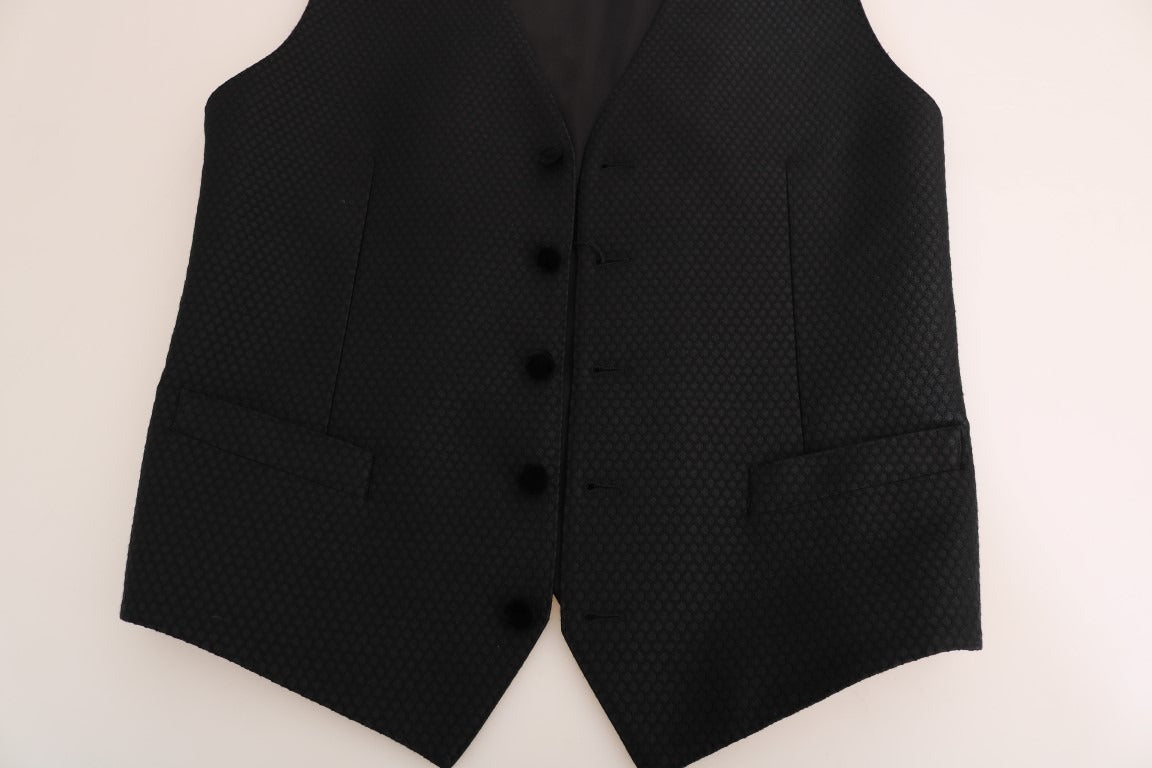 Black polka dot pattern vest by Dolce & Gabbana, featuring a stylish sleeveless design with polka dot print.
