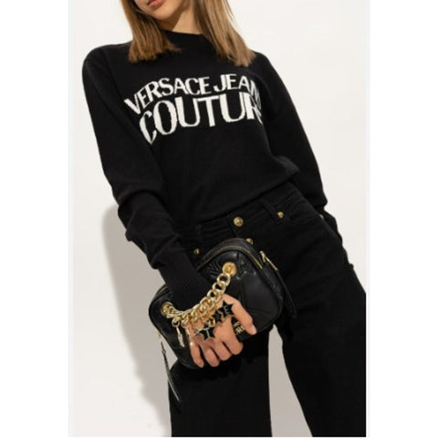Versace Jeans 75VA4BC5_ZS806_899 denim jacket with signature logo, displayed on a hanger against a neutral background.