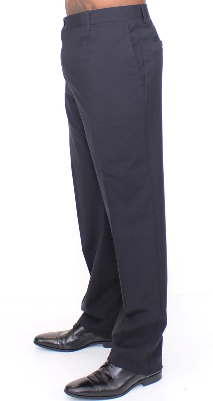 Black wool stretch pleated pants by Dolce & Gabbana, featuring a tailored fit and stylish pleats.