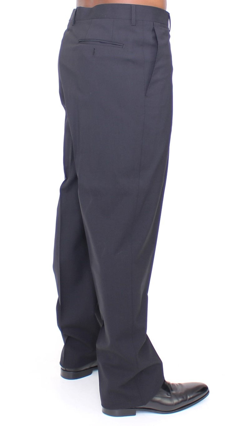 Black wool stretch pleated pants by Dolce & Gabbana, featuring tailored fit and classic design, shown on a model.