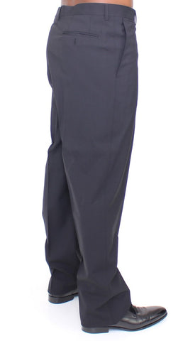Black wool stretch pleated pants by Dolce & Gabbana, featuring tailored fit and classic design, shown on a model.