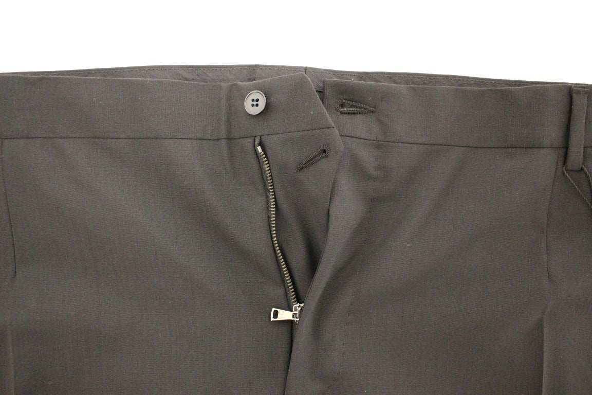 Black wool stretch pleated pants by Dolce & Gabbana, featuring tailored fit and classic design, displayed on a neutral background.