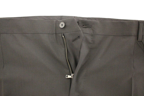 Black wool stretch pleated pants by Dolce & Gabbana, featuring tailored fit and classic design, displayed on a neutral background.