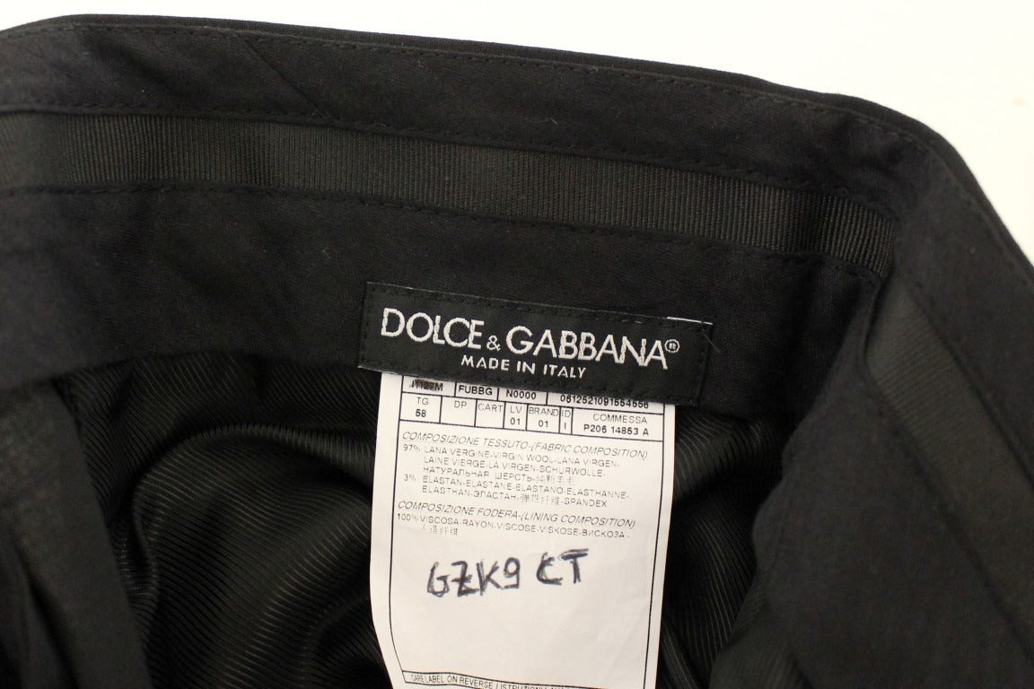 Black wool stretch pleated pants by Dolce & Gabbana, featuring tailored fit and elegant pleats, shown on a model.