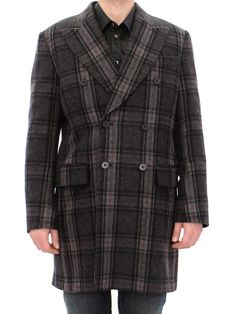 Gray double-breasted coat jacket by Dolce & Gabbana, featuring tailored lapels and classic design, displayed on a hanger.